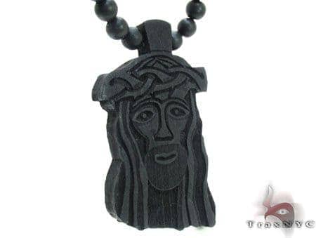 black wooden jesus piece