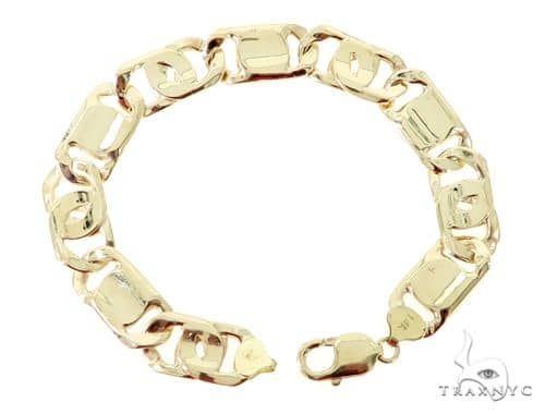 Sold at Auction: Diamond, emerald and 18k yellow gold Tiger bracelet