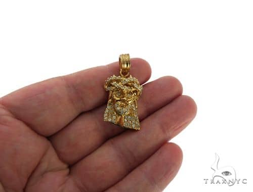 small gold jesus pendant