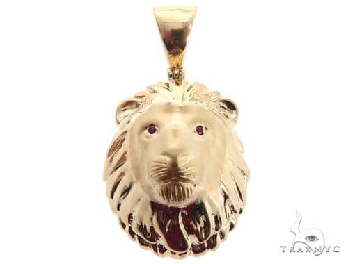 gold lion pendant with ruby eyes