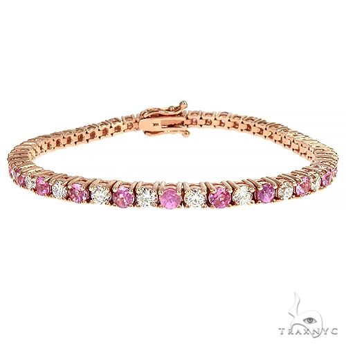 Graduated Pink Sapphire & Diamond Hinged Bangle Bracelet in Rose Gold |  Borsheims